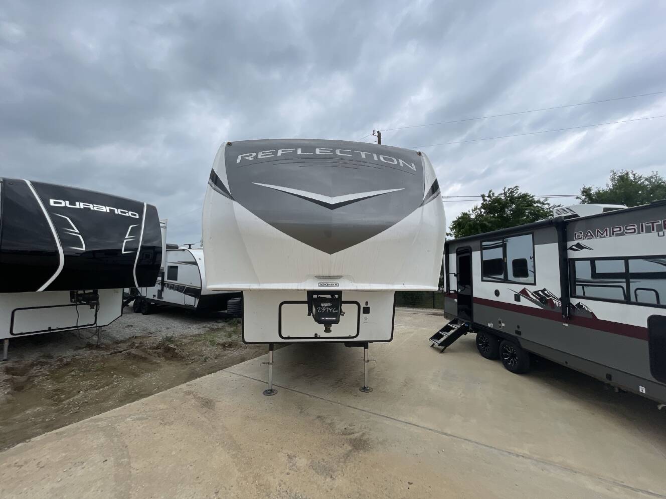 A photo of this 2023 Grand Design REFLECTION 320MKS