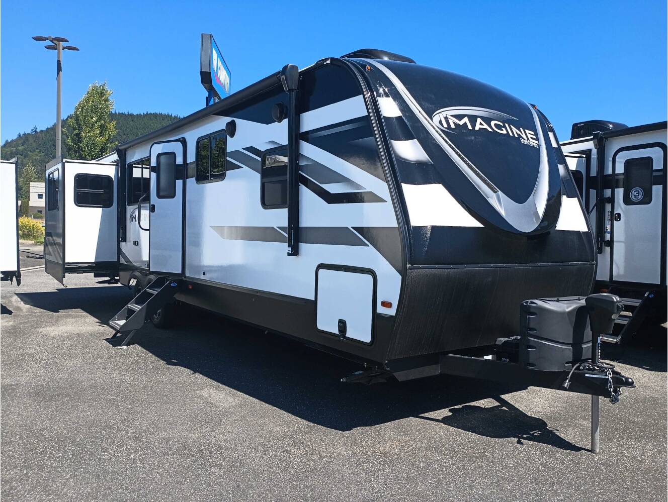 A photo of this 2022 Grand Design Imagine 3100RD