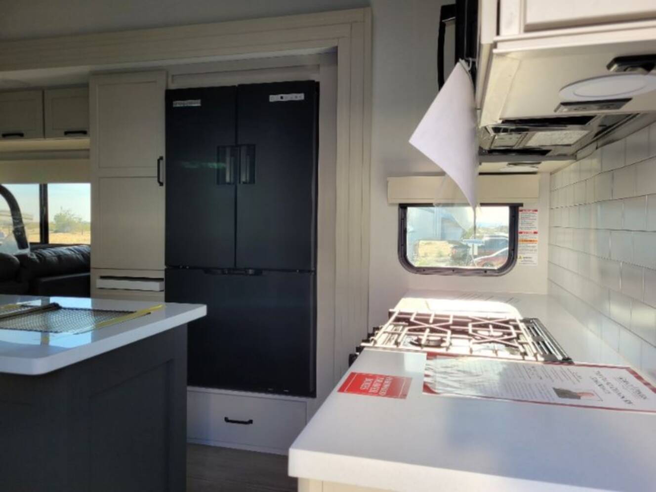 A photo of this 2026 Grand Design Momentum G-Class Fifth Wheel 394G