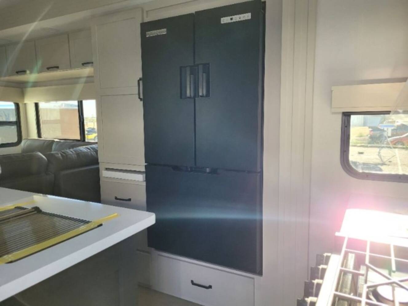 A photo of this 2026 Grand Design Momentum G-Class Fifth Wheel 394G