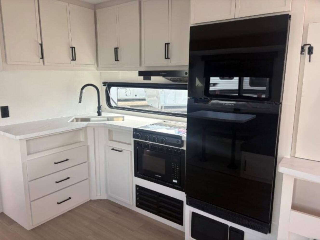 A photo of this 2026 Grand Design Momentum MAV 24MAV