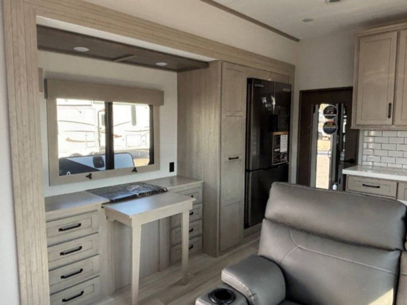 A photo of this 2025 Grand Design Momentum M-Class 344M