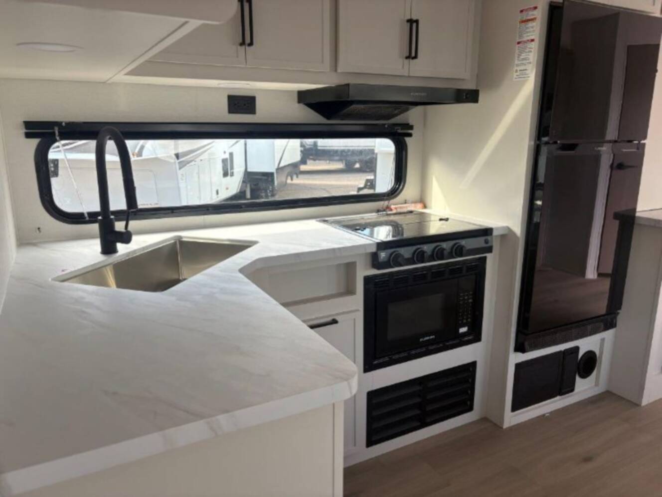 A photo of this 2026 Grand Design Momentum MAV 24MAV
