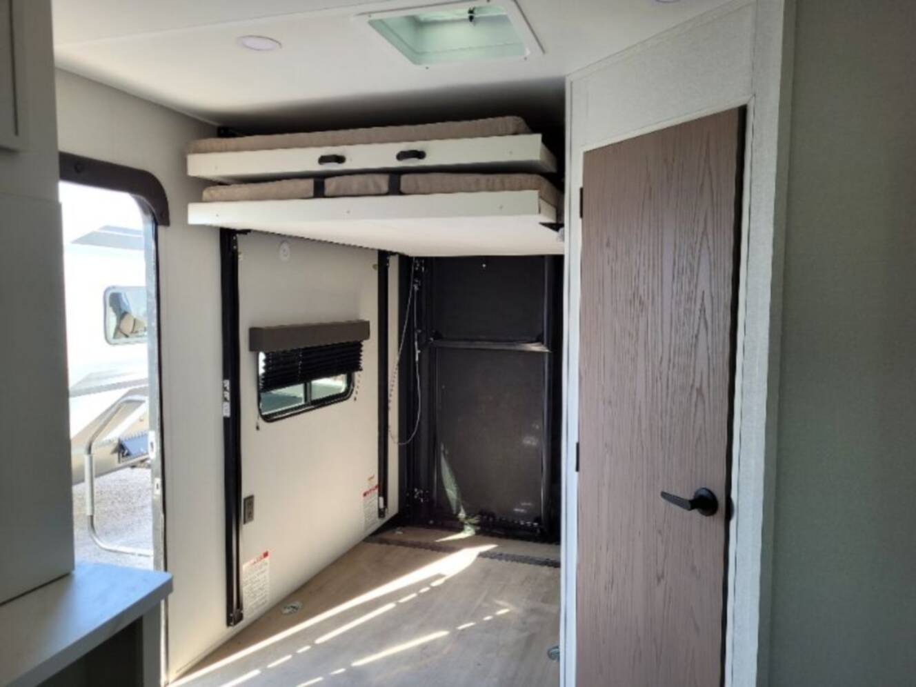 A photo of this 2026 Grand Design Momentum MAV 27MAV