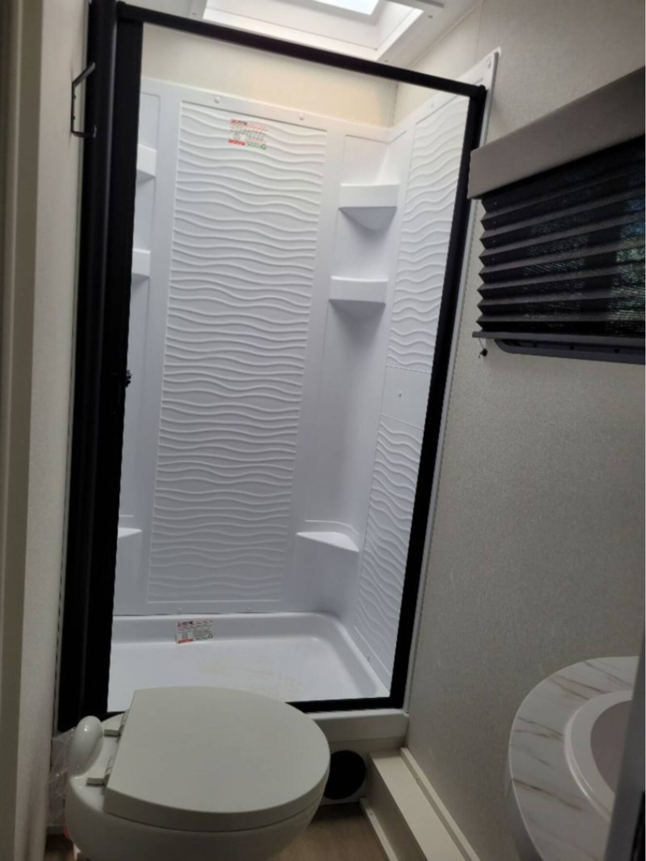 A photo of this 2026 Grand Design Momentum MAV 27MAV