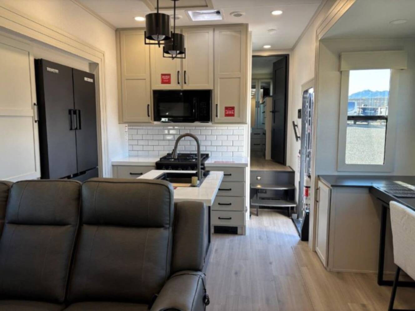 A photo of this 2026 Grand Design Momentum M-Class 399M