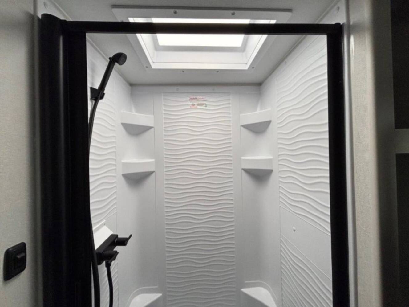 A photo of this 2026 Grand Design Transcend 325BHT