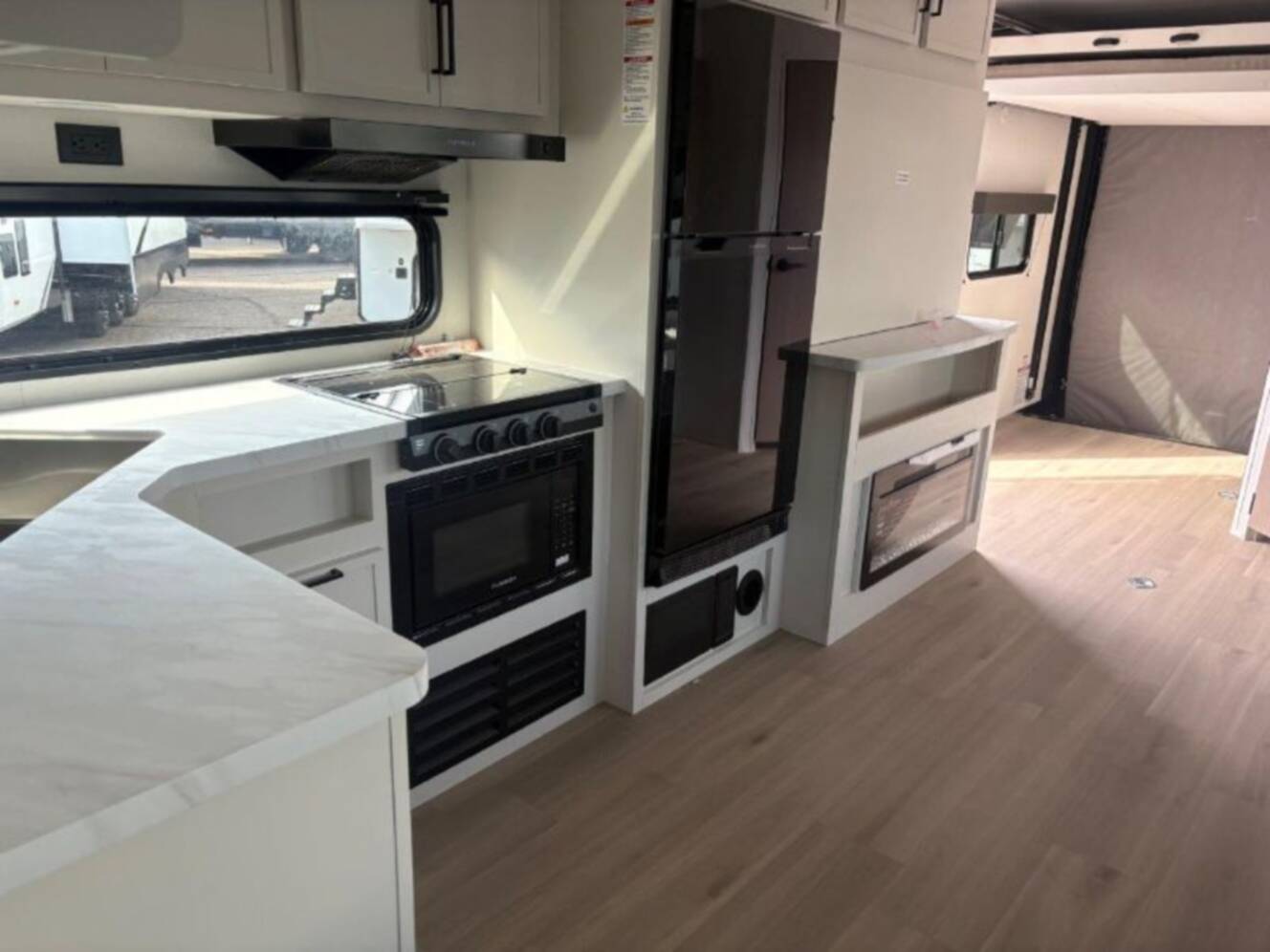 A photo of this 2026 Grand Design Momentum MAV 24MAV