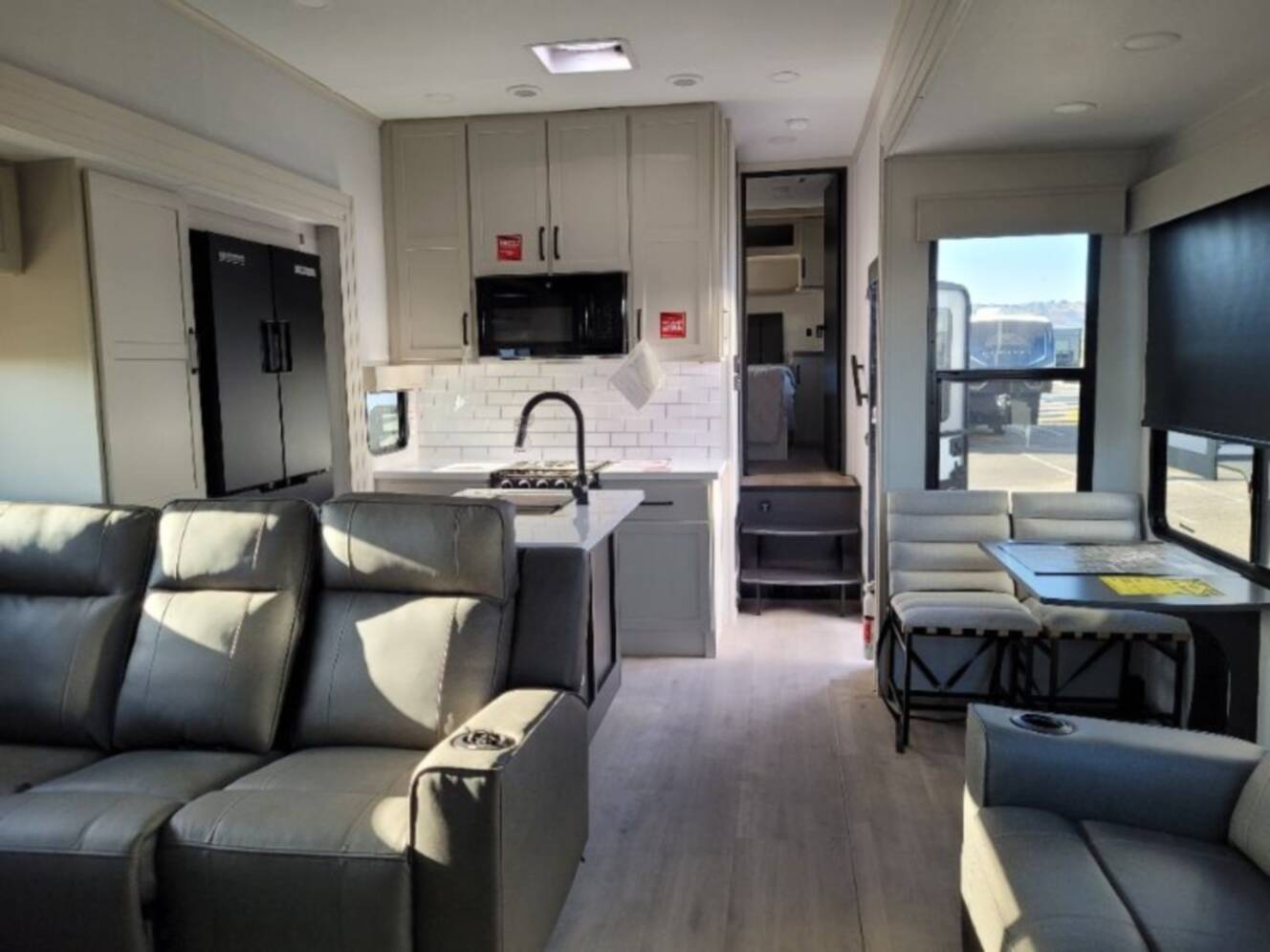 A photo of this 2026 Grand Design Momentum G-Class Fifth Wheel 394G