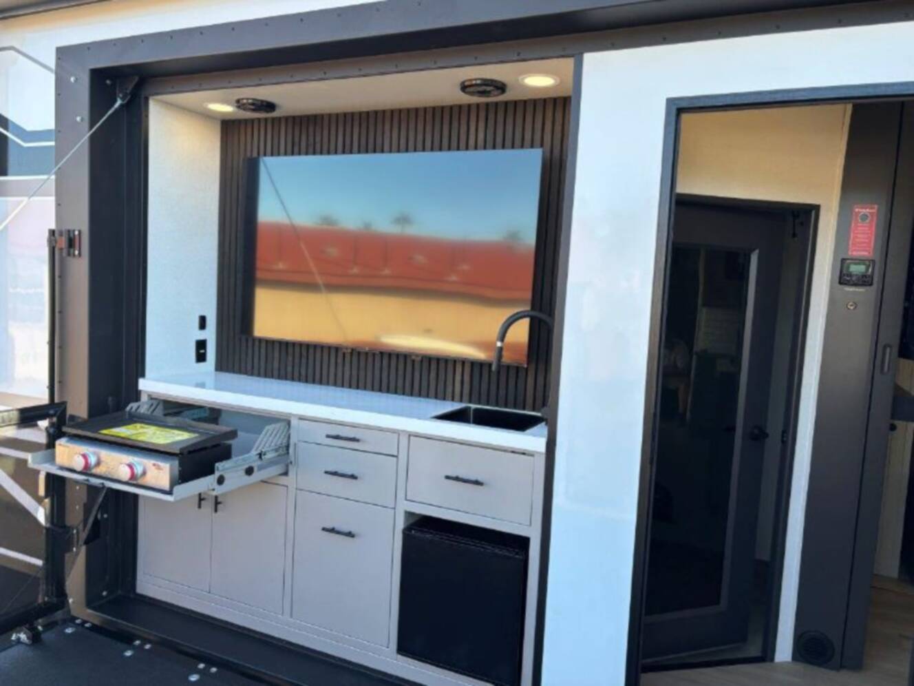 A photo of this 2026 Grand Design Momentum M-Class 399M
