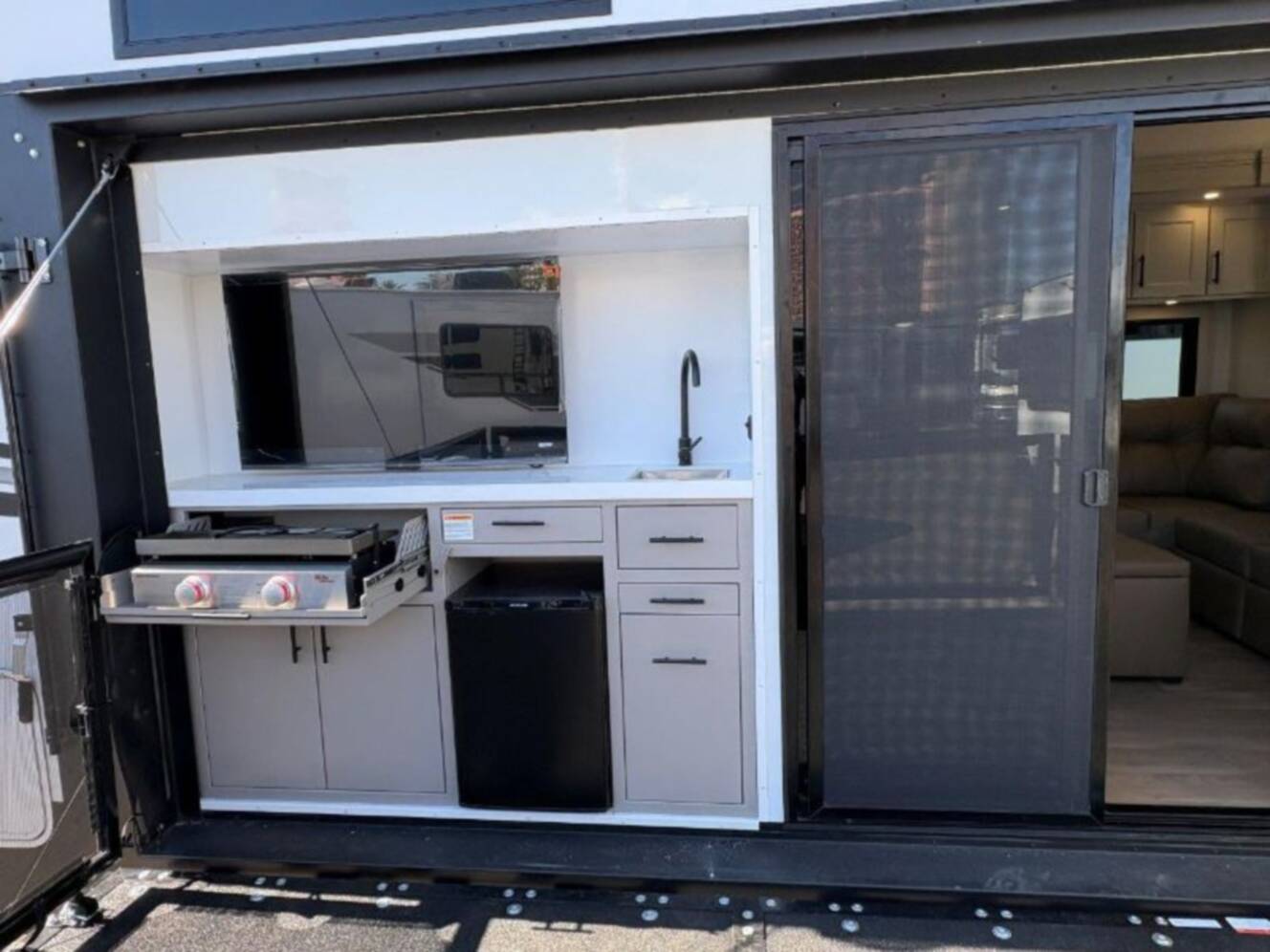 A photo of this 2026 Grand Design Solitude 414LJMJ