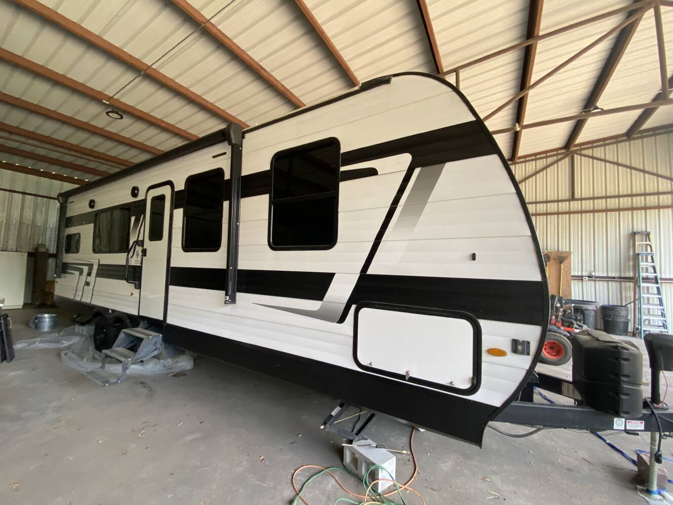 A photo of this 2024 Grand Design MOMENTUM MAV 27MAV