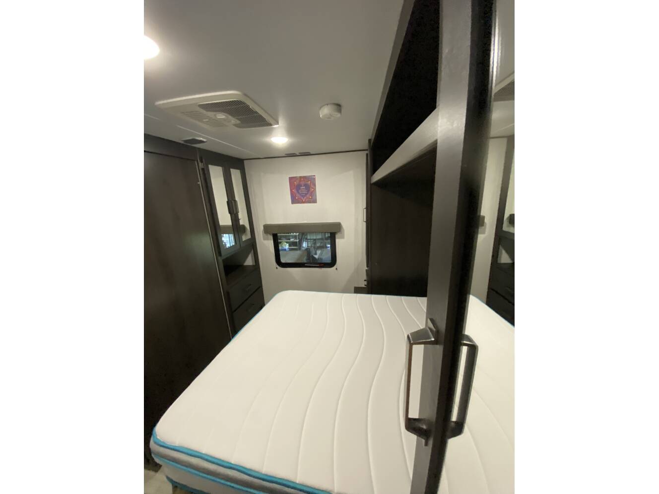 A photo of this 2024 Grand Design MOMENTUM MAV 27MAV