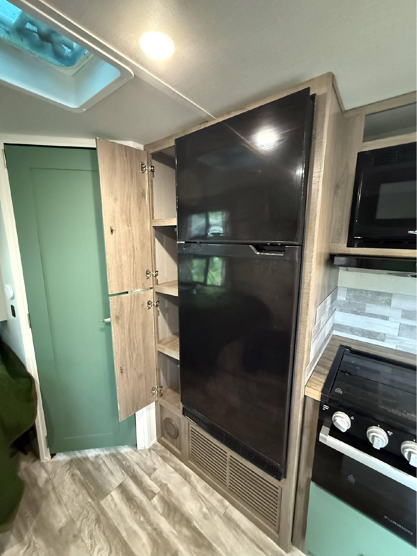 A photo of this 2022 Grand Design IMAGINE XLS 21BHE