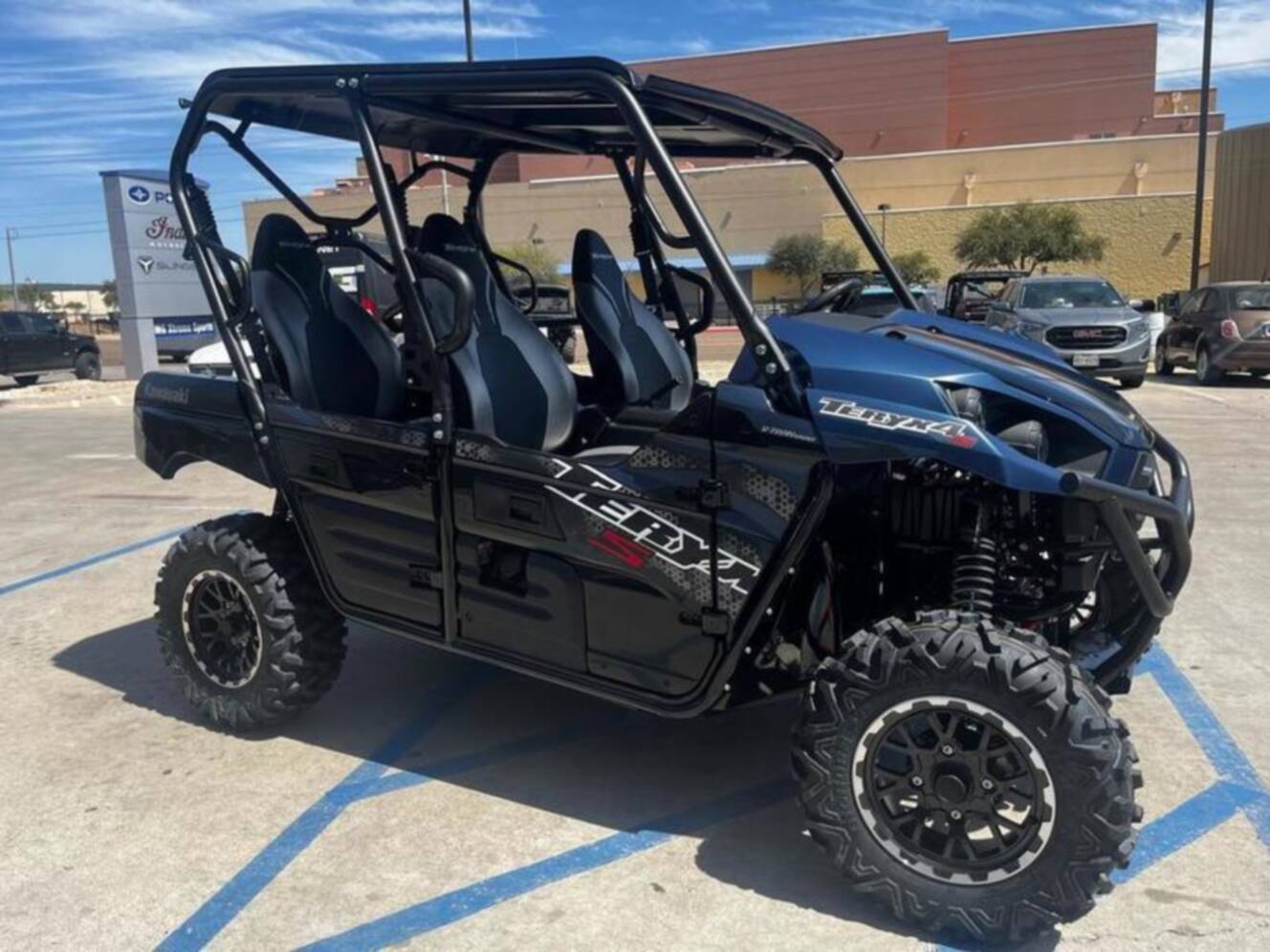 A photo of this 2025 Kawasaki Teryx4 S LEMetallic Matte Twilight BlueSuper Black