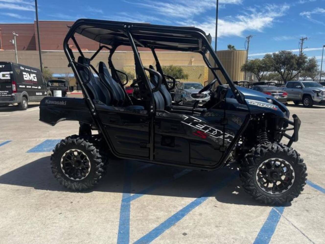 A photo of this 2025 Kawasaki Teryx4 S LEMetallic Matte Twilight BlueSuper Black