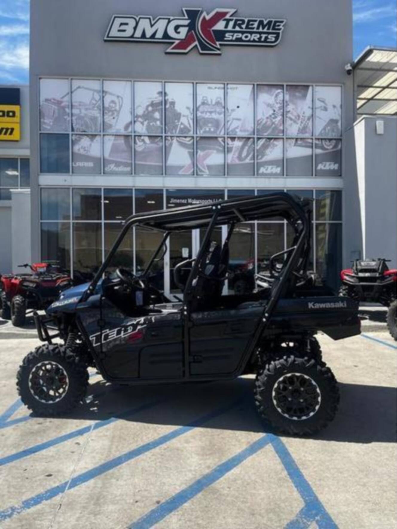 A photo of this 2025 Kawasaki Teryx4 S LEMetallic Matte Twilight BlueSuper Black