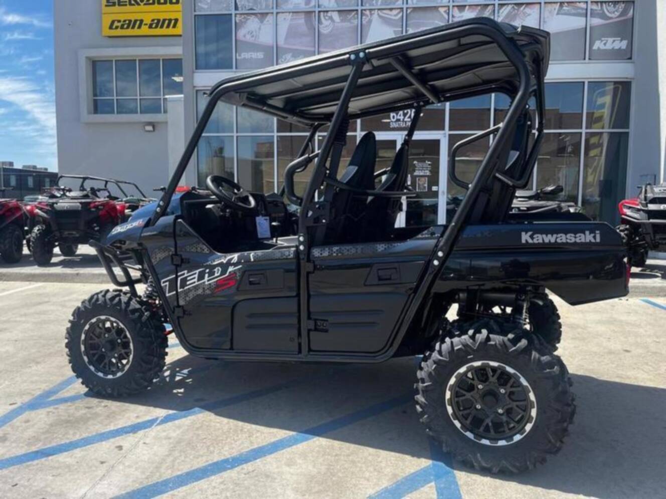 A photo of this 2025 Kawasaki Teryx4 S LEMetallic Matte Twilight BlueSuper Black