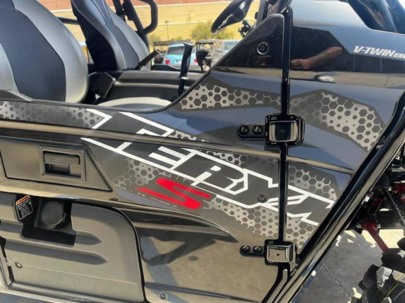 A photo of this 2025 Kawasaki Teryx4 S LEMetallic Matte Twilight BlueSuper Black