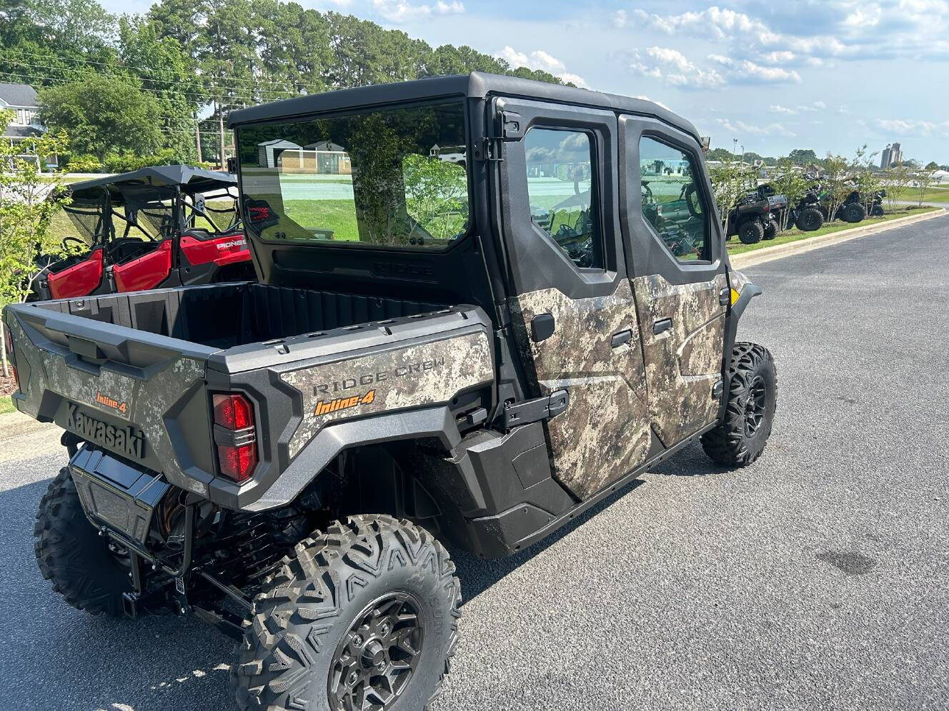 A photo of this 2026 Kawasaki RIDGE® CREW HVAC Camo