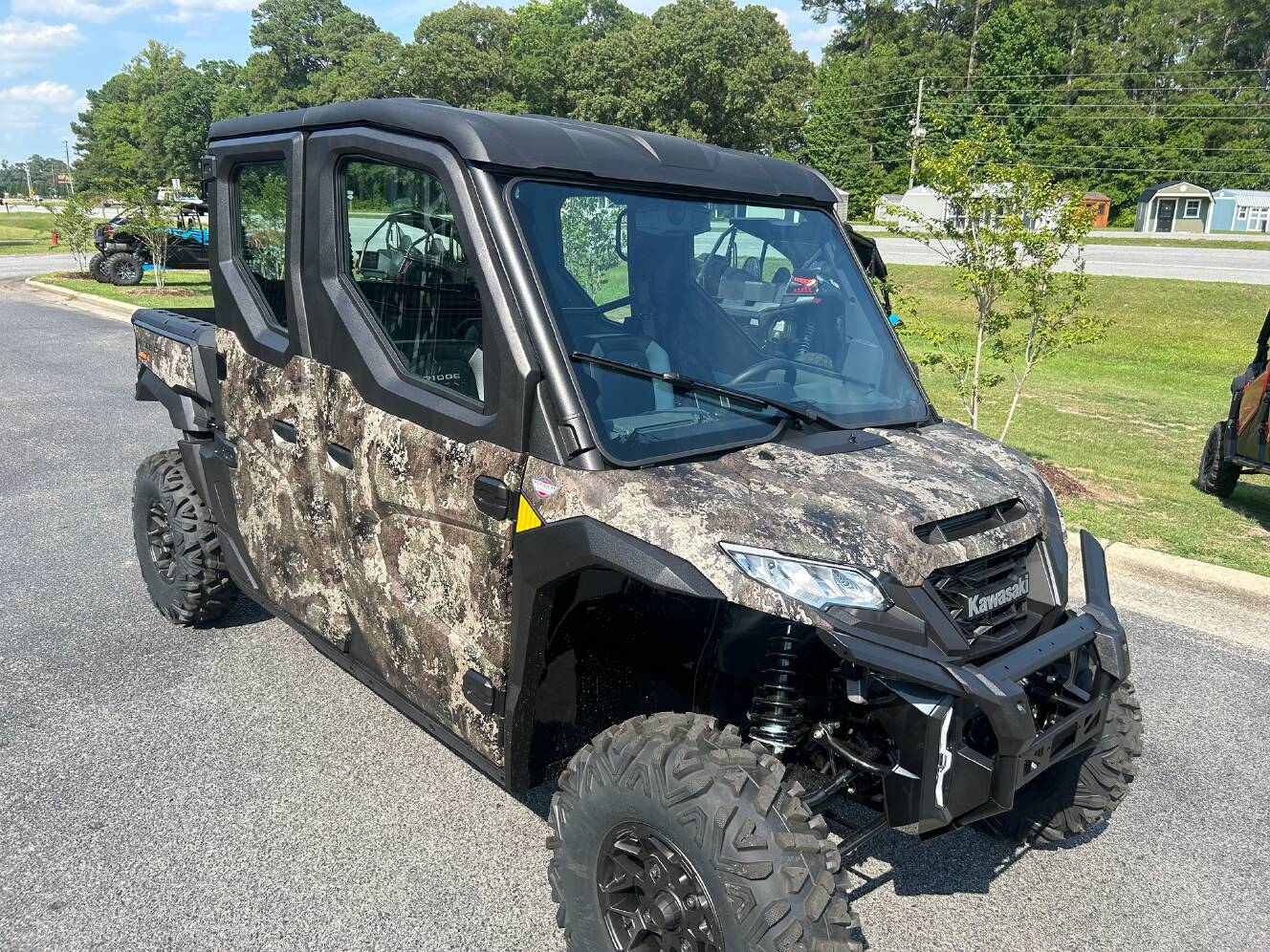 A photo of this 2026 Kawasaki RIDGE® CREW HVAC Camo