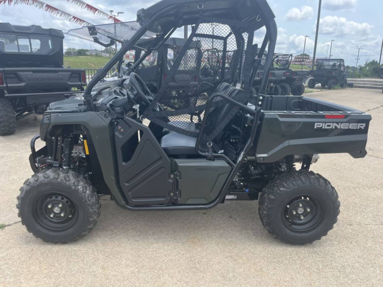A photo of this 2026 Honda® Pioneer 520