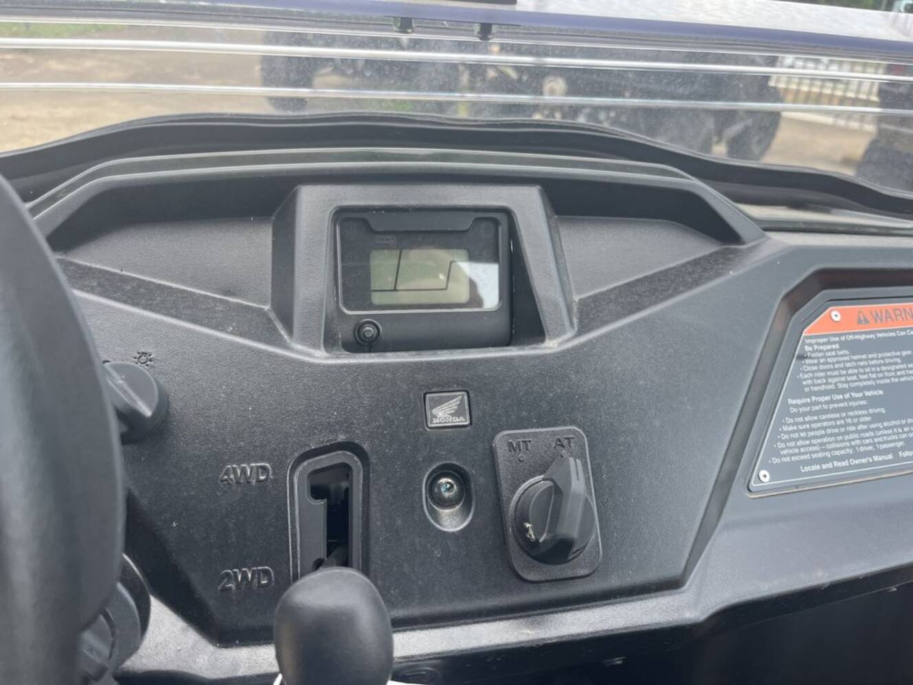 A photo of this 2026 Honda® Pioneer 520