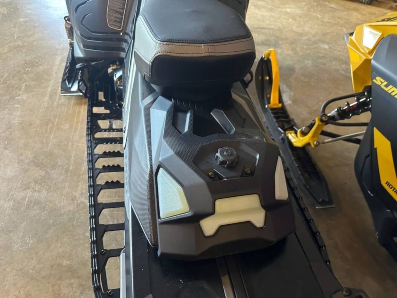 A photo of this 2026 Lynx® Xterrain RE 850 E-TEC Turbo R_10.25_Silver