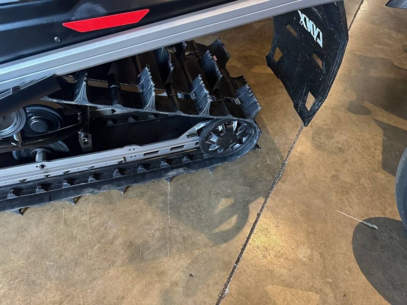 A photo of this 2026 Lynx® Xterrain RE 850 E-TEC Turbo R_10.25_Silver