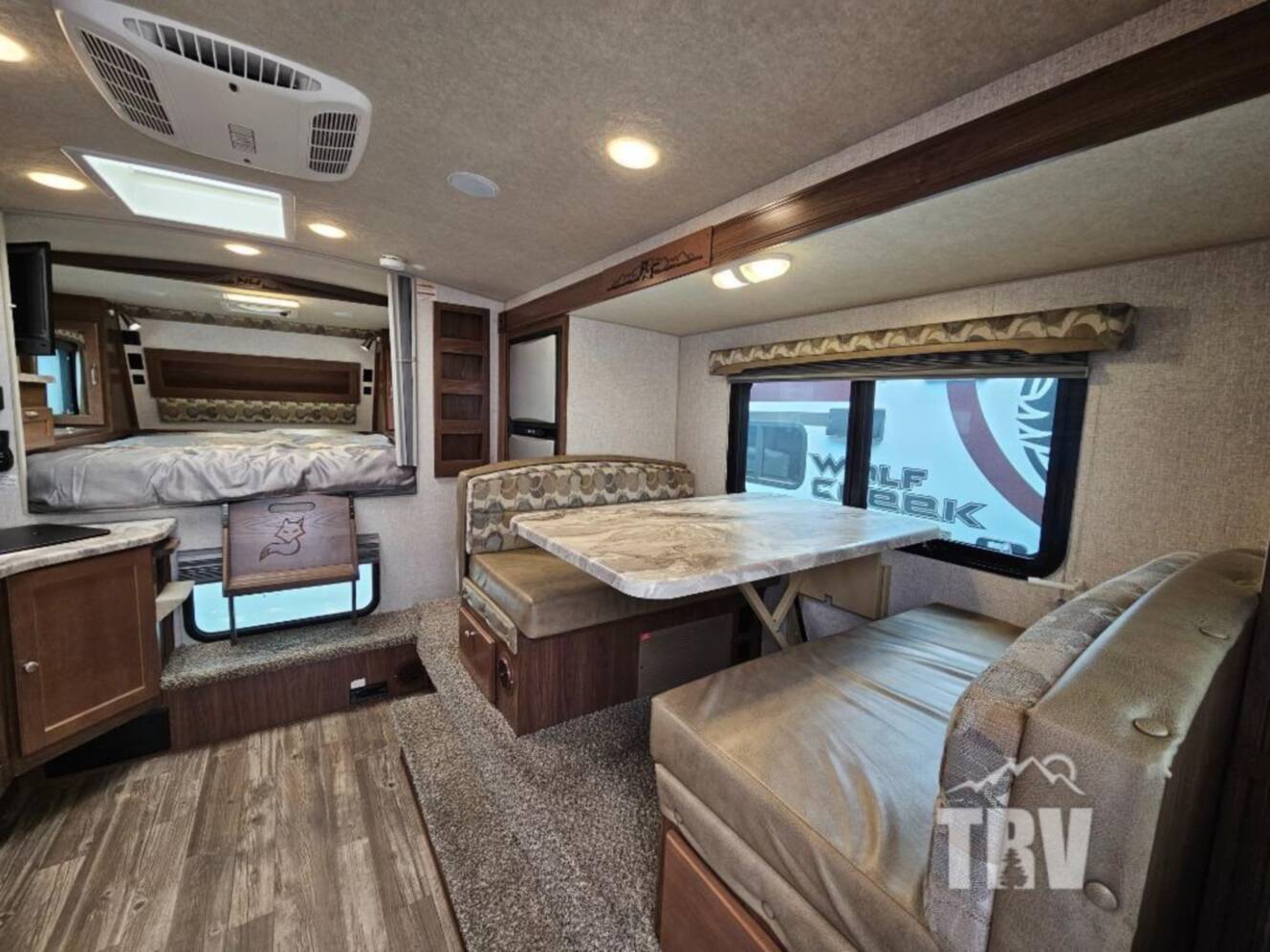 A photo of this 2023 Northwood Arctic Fox Camper 990 Wet Bath