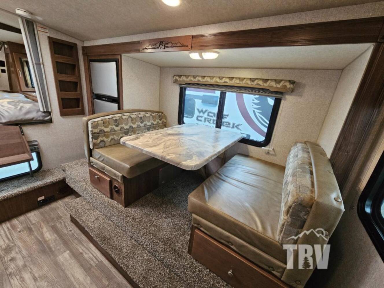 A photo of this 2023 Northwood Arctic Fox Camper 990 Wet Bath