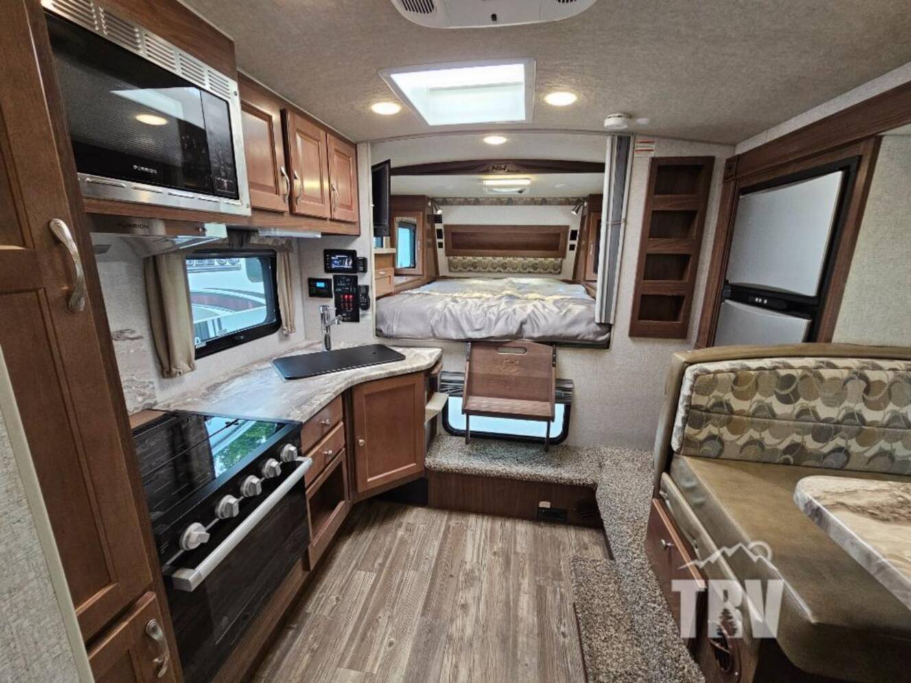 A photo of this 2023 Northwood Arctic Fox Camper 990 Wet Bath