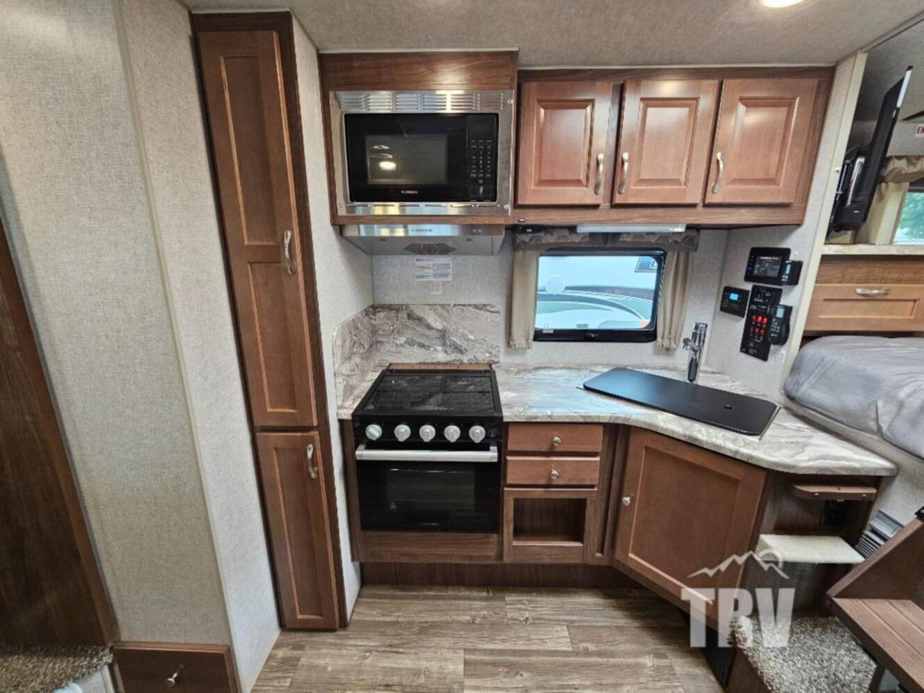 A photo of this 2023 Northwood Arctic Fox Camper 990 Wet Bath