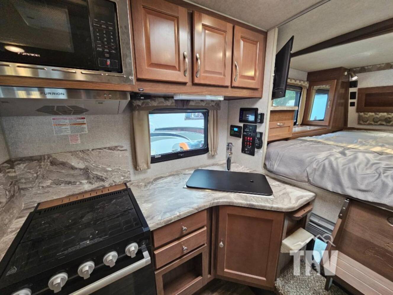 A photo of this 2023 Northwood Arctic Fox Camper 990 Wet Bath
