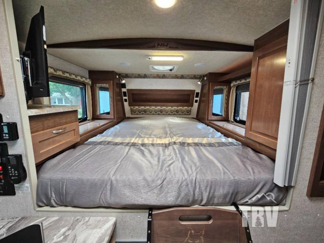 A photo of this 2023 Northwood Arctic Fox Camper 990 Wet Bath