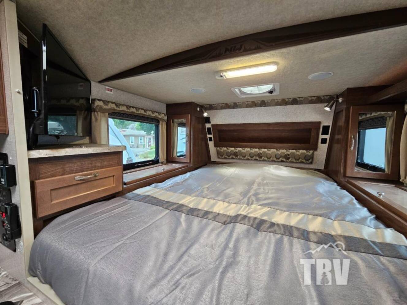 A photo of this 2023 Northwood Arctic Fox Camper 990 Wet Bath