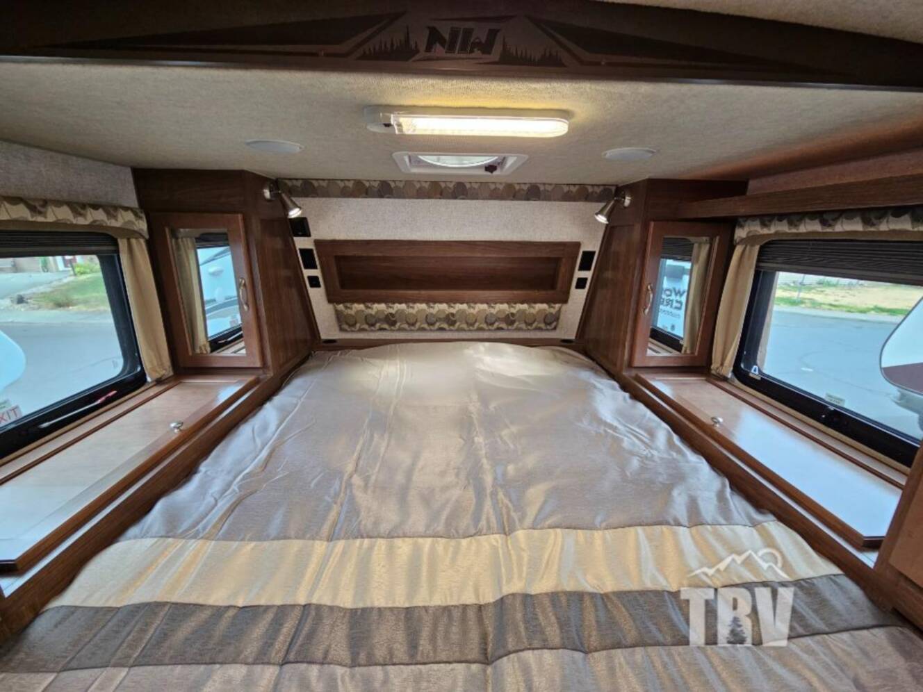 A photo of this 2023 Northwood Arctic Fox Camper 990 Wet Bath