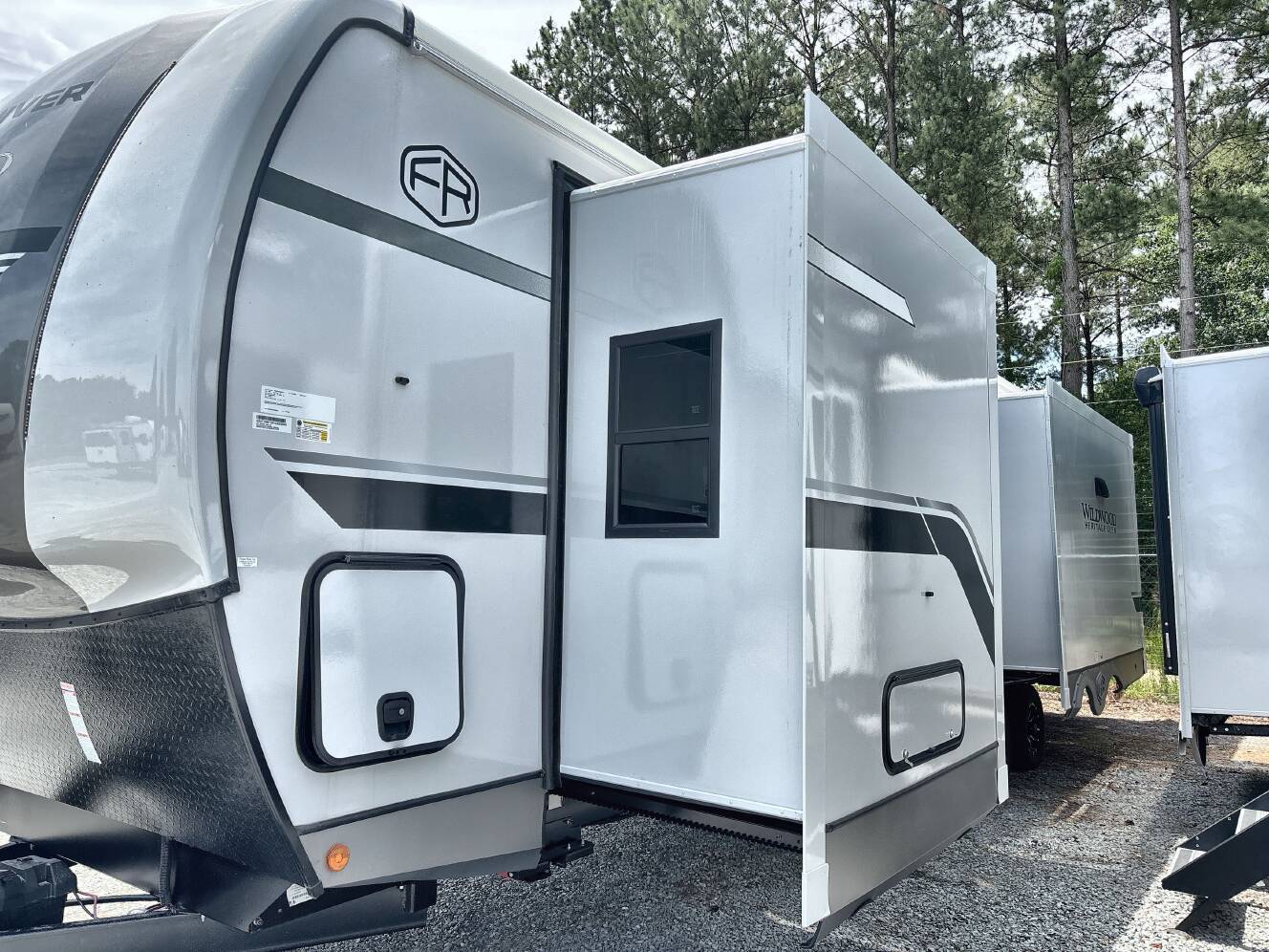 A photo of this 2027 Forest River WILDWOOD HERITAGE GLEN 301FAM