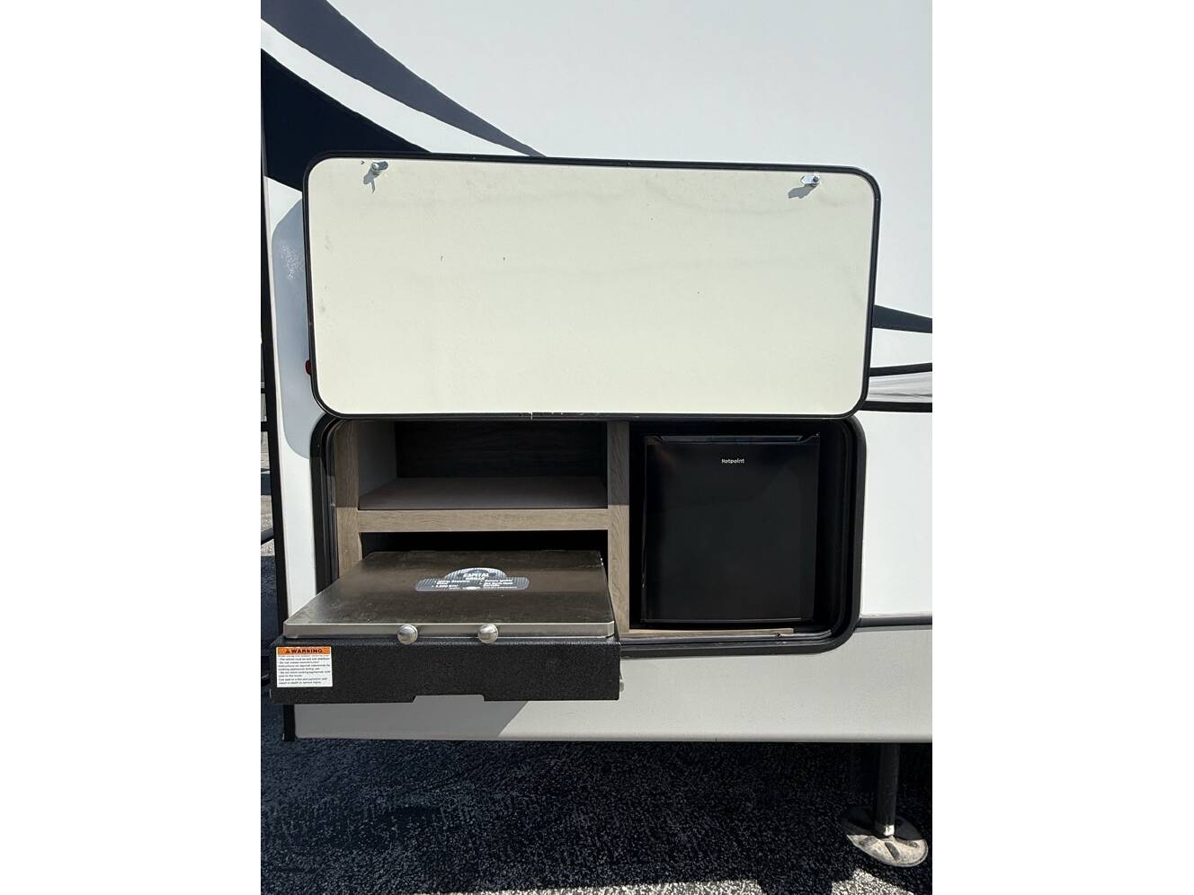 A photo of this 2021 Keystone COUGAR 25RES HALF TON