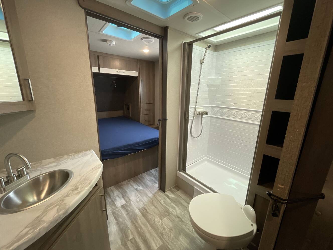 A photo of this 2022 Grand Design IMAGINE XLS 23LDE