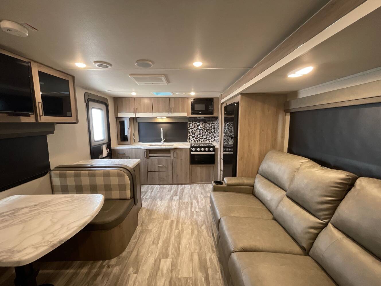A photo of this 2022 Grand Design IMAGINE XLS 23LDE