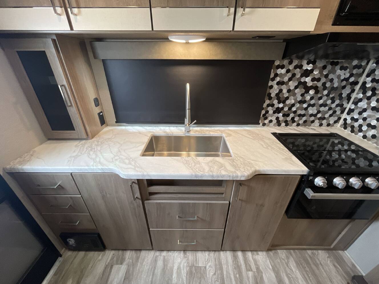 A photo of this 2022 Grand Design IMAGINE XLS 23LDE