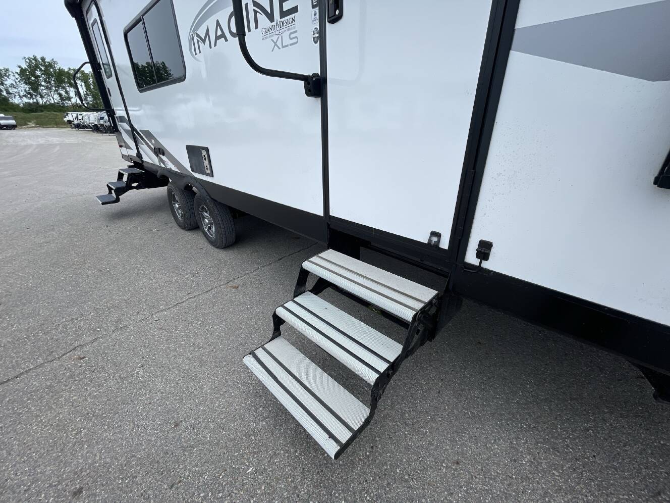 A photo of this 2022 Grand Design IMAGINE XLS 23LDE