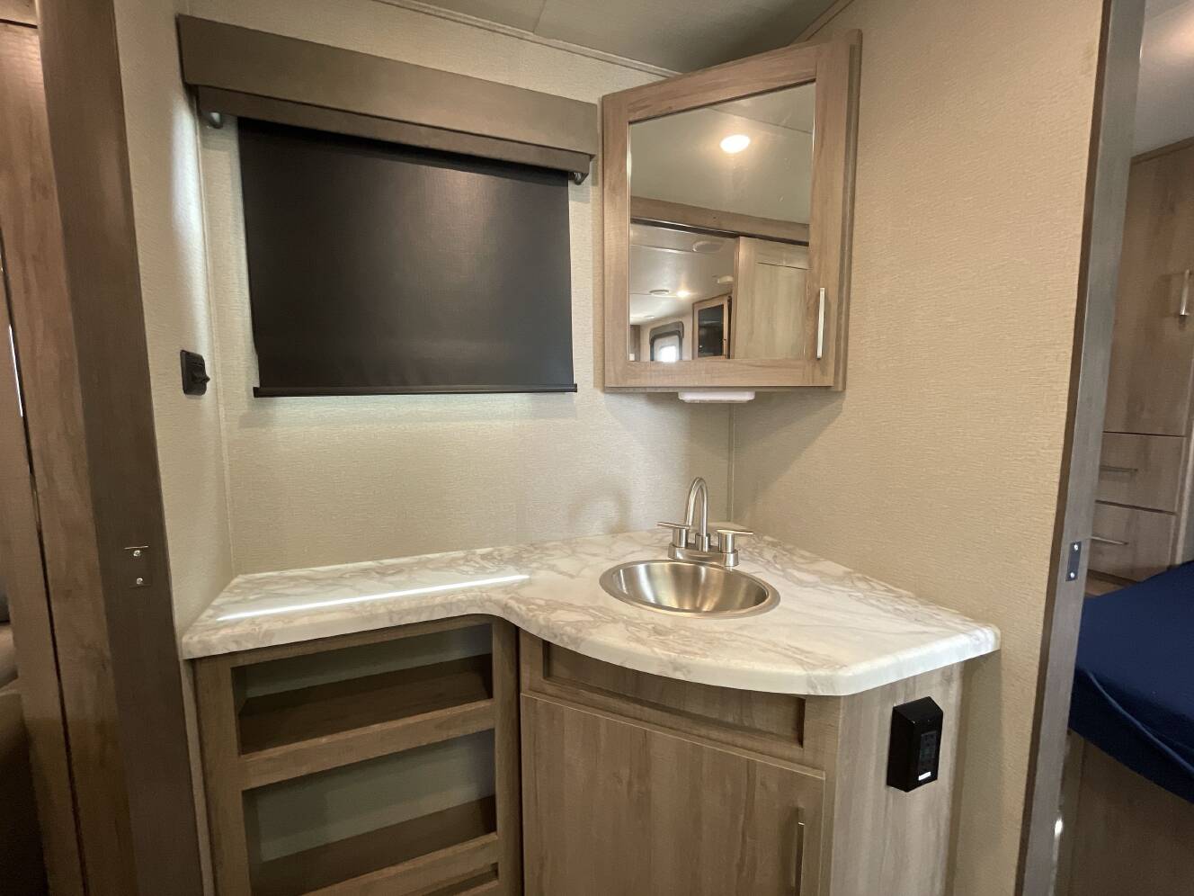 A photo of this 2022 Grand Design IMAGINE XLS 23LDE