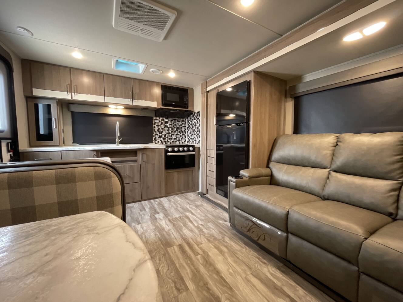 A photo of this 2022 Grand Design IMAGINE XLS 23LDE