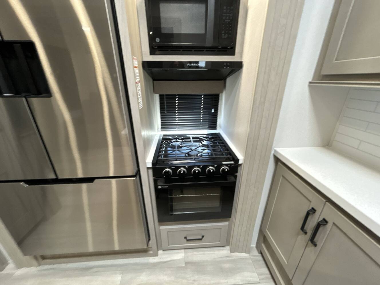 A photo of this 2025 Grand Design MOMENTUM G CLASS 350G
