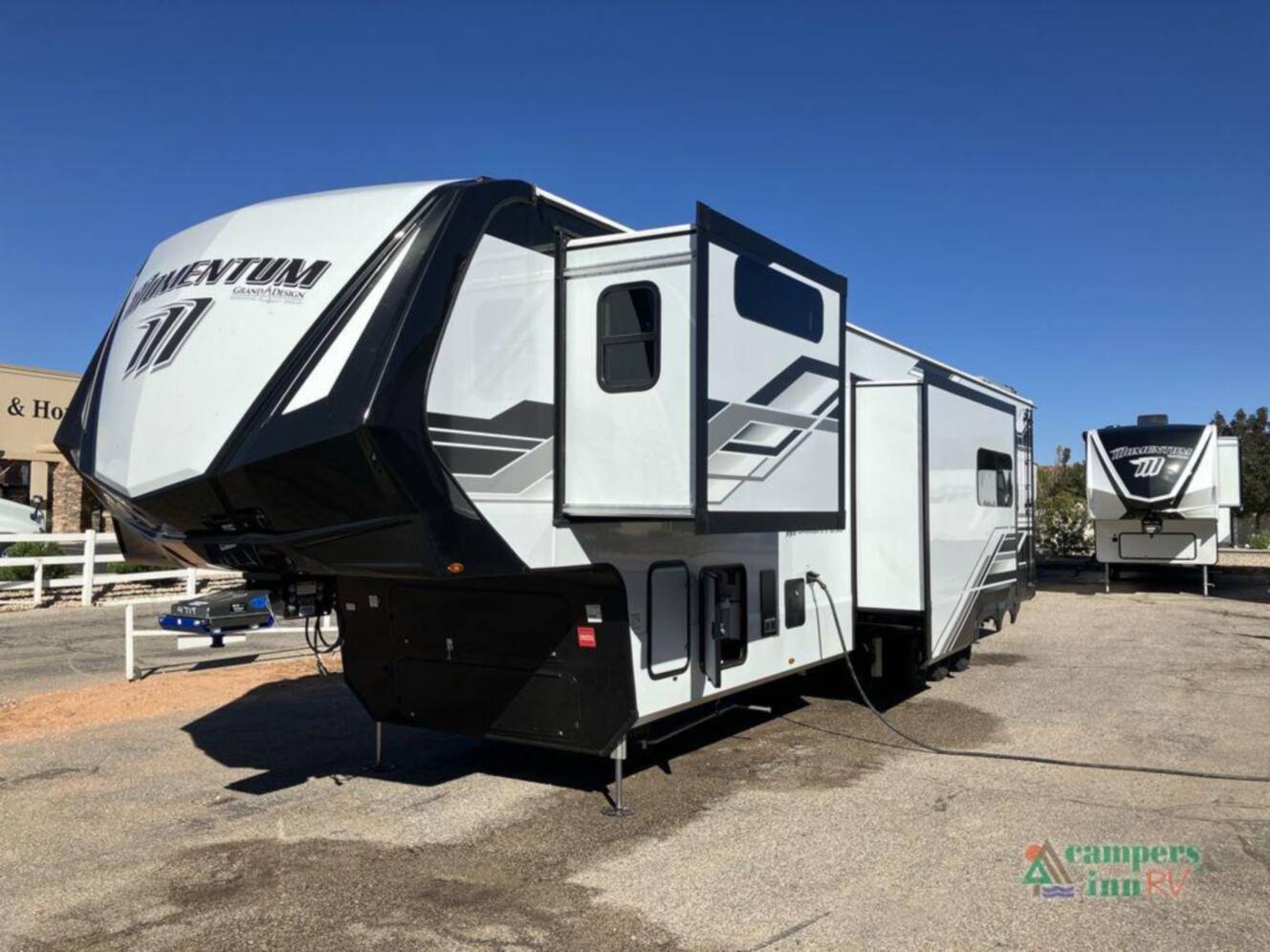 A photo of this 2026 Grand Design Momentum M-Class 399M