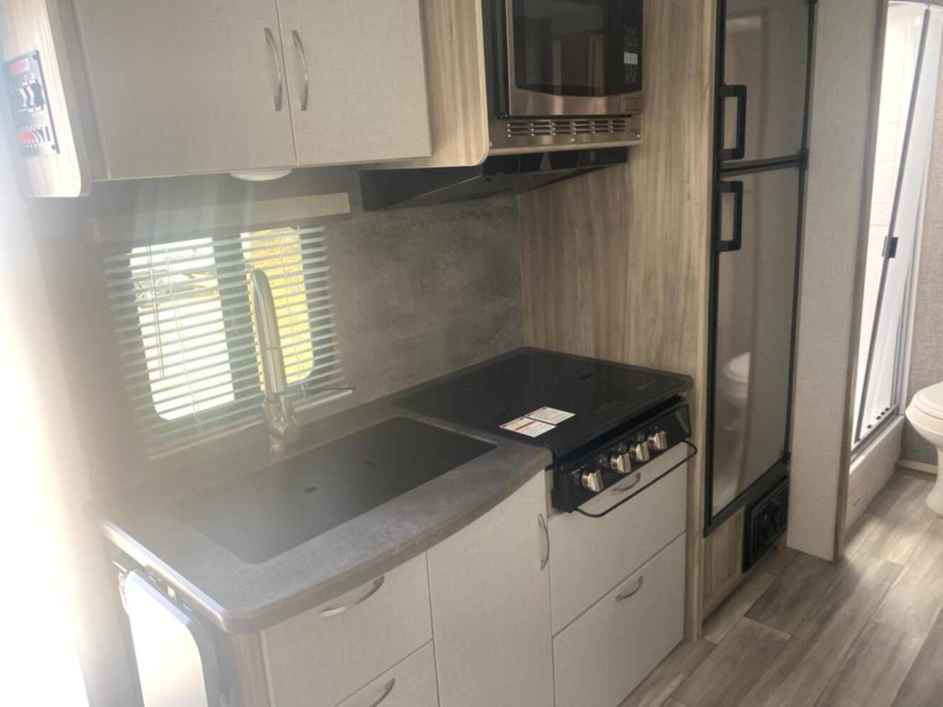 A photo of this 2022 Winnebago Industries Towables Micro Minnie 2108DS