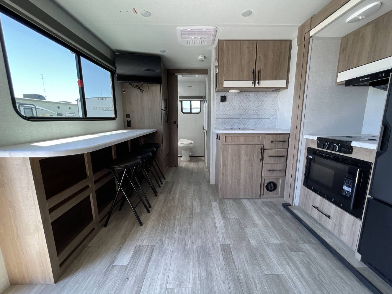 A photo of this 2023 Grand Design IMAGINE AIM 18BH
