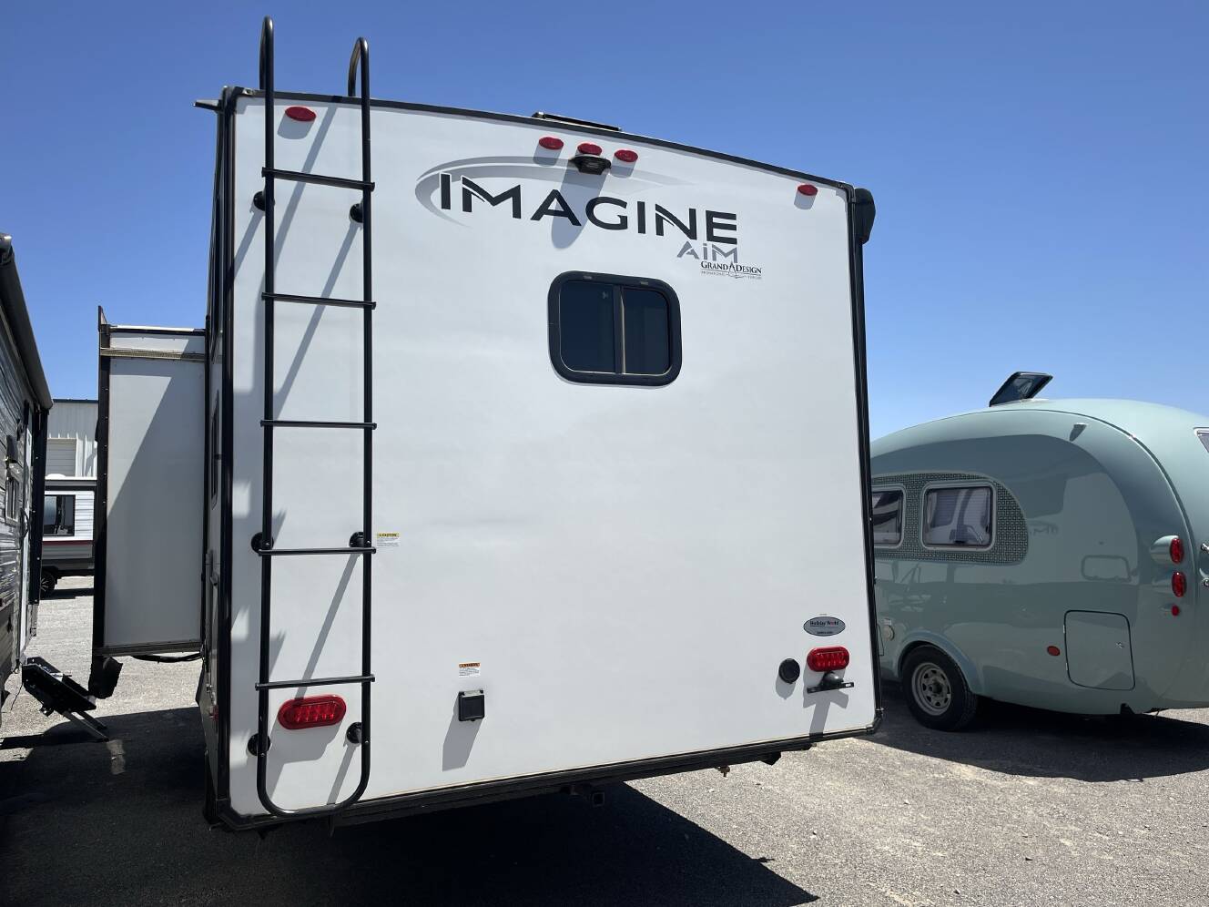 A photo of this 2023 Grand Design IMAGINE AIM 18BH
